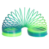 Oversized, colorful spring toy, captivating with its ability to cascade and flip, offering engaging play.